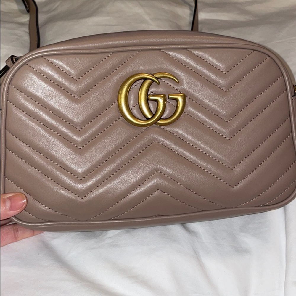 GG Marmont small leather matelassé shoulder bag.
